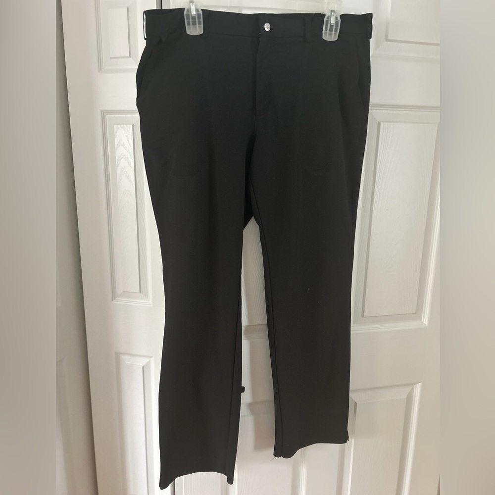 Tiger Woods black golf pants